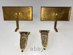 Pair of Art Deco wall sconces in gilded bronze with two lights
