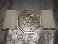 Pair of art deco wall lights in bronze depicting a nude female dancer sculpture