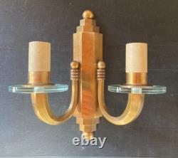 Pair of gilt bronze wall sconces with crystal glass discs Art Deco horn steps 1930