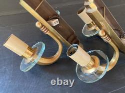 Pair of gilt bronze wall sconces with crystal glass discs Art Deco horn steps 1930