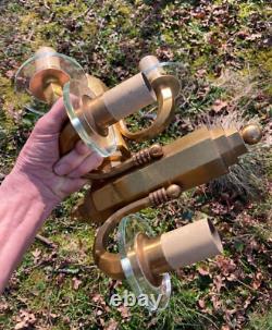 Pair of gilt bronze wall sconces with crystal glass discs Art Deco horn steps 1930