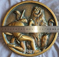 Roundel, bronze bas-relief Art Deco Hunter and Bear, signed Roncourt Brault