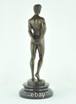 Solid bronze sculpture of a sexy athlete in Art Deco style