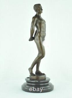 Solid bronze sculpture of a sexy athlete in Art Deco style