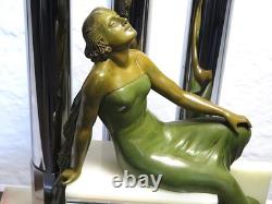Splendid Art Deco bronze, chrome, and onyx clock  <br/>  