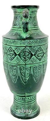 Vintage Japanese bronze vase in archaic style with relief motif, antique Art Deco style