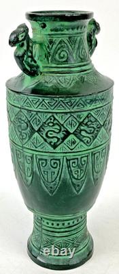 Vintage Japanese bronze vase in archaic style with relief motif, antique Art Deco style