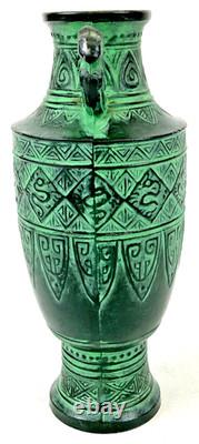 Vintage Japanese bronze vase in archaic style with relief motif, antique Art Deco style