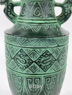 Vintage Japanese bronze vase in archaic style with relief motif, antique Art Deco style