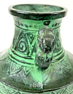 Vintage Japanese bronze vase in archaic style with relief motif, antique Art Deco style