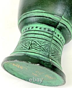 Vintage Japanese bronze vase in archaic style with relief motif, antique Art Deco style