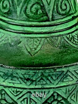 Vintage Japanese bronze vase in archaic style with relief motif, antique Art Deco style