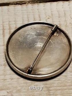 Ancienne broche art déco signée GV bronze argenté