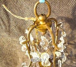 Beau lustre ancien en bronze et pampilles de cristal taillé. H. 45 cm