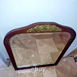 Beau miroir biseauté en bois et bronze Art Deco