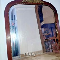 Beau miroir biseauté en bois et bronze Art Deco