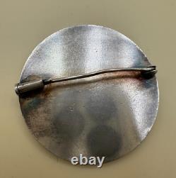 Époque Art déco, broche en bronze argenté, signée Jean Vernon