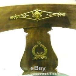 Fauteuil empire en acajou belle ornementation de bronzes fin. XIX siècle