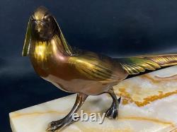 Grand sujet au faisan en bronze irisé sur terrasse en onyx époque Art déco
