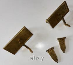 Paire d'appliques art déco en bronze doré a deux lumières