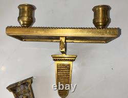 Paire d'appliques art déco en bronze doré a deux lumières