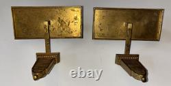 Paire d'appliques art déco en bronze doré a deux lumières