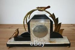 Pendule Art Déco à décor d'oiseaux en bronze style E. Guy