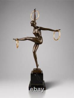 Sculpture Art déco de danseuse aux anneaux en bronze patiné sur socle effet marb