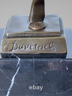 Sculpture Art déco de danseuse aux anneaux en bronze patiné sur socle effet marb