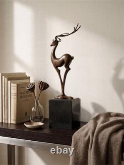 Sculpture de cerf Art Déco en bronze patiné signé Coenrad sur socle effet marbre