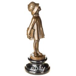 Sculpture en bronze Art Déco Fille avec sac d'après Alex Kelety