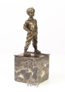 Sculpture en bronze Art déco un garçon avec des skis d'après Ferdinand Preiss