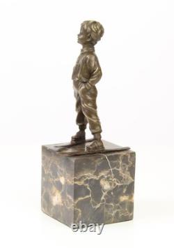 Sculpture en bronze Art déco un garçon avec des skis d'après Ferdinand Preiss