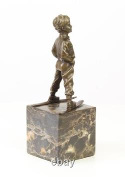 Sculpture en bronze Art déco un garçon avec des skis d'après Ferdinand Preiss