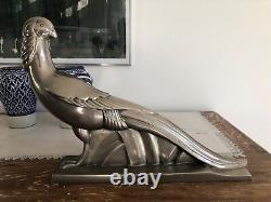 Très belle sculpture d'oiseau Art Deco en bronze nickelé